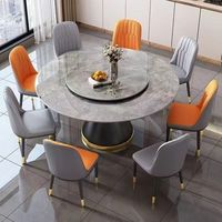 Ensemble de table à manger moderne en pierre frittée ronde avec plateau tournant et chaises rembourrées