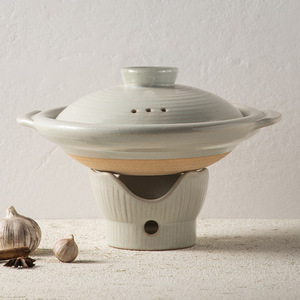 Cast iron casserole pot with lid, ceramic clay finish