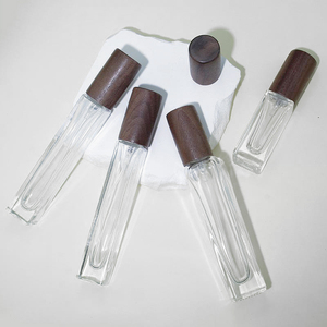 ขวดน้ำหอมทำจากแก้วใสขนาด10มล. 15มล. ขวดสเปรย์พร้อมฝาไม้ - Product Image 3