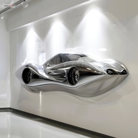 Décoration murale de salle d'exposition publique intérieure personnalisée moderne 304/316SS miroir polonais grande sculpture murale abstraite de voiture en acier inoxydable