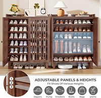 Meuble à chaussures fin en noyer IRONCK avec portes à lattes, 6 étagères réglables et plateau supérieur à rebord, rangement d'entrée peu encombrant.