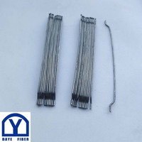Fibre d'ancrage en acier collée 3D 80/60 BG 0,75 mm x 60 mm avec extrémités crochées pour pavés en béton