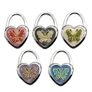 Appendiabiti personalizzati per borsa con Logo personalizzato a forma di cuore con farfallina a farfalla in strass ganci per borsa in metallo