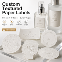 Étiquettes en papier texturé personnalisées avec texte en relief, autocollants en papier gaufré pour l'emballage de parfums, de soins de la peau et de bougies, OEM