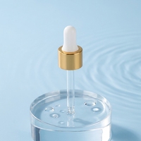 Flacon cosmétique transparent rechargeable avec compte-gouttes et col doré pour l'emballage des soins de la peau