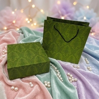 Sac de shopping en papier couché recyclable de luxe personnalisé avec poignée en corde de coton et pelliculage mat pour les entreprises