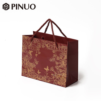 Sac cadeau en papier rouge vin de luxe PINUO, imprimé floral et papillon en feuille d'or, logo personnalisé, sac de shopping pour emballage de bijoux