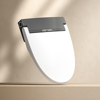 Bidet automatique intelligent en plastique noir en forme de V avec siège chauffant, fermeture douce, auto-nettoyant, affichage numérique, couvercle, télécommande, design moderne