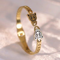 Vente de gros Bracelets haut de gamme en acier inoxydable à double tête de léopard incrustés de diamants en or 18 carats