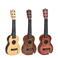 Guitare jouet de simulation pour enfants - 3 couleurs disponibles, mini guitare pour l'éducation musicale précoce