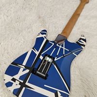 Guitare professionnelle de qualité supérieure avec corps en tilleul rayé bleu, blanc et noir, manche en érable, touche en palissandre, micros H, et tremolo double verrouillable