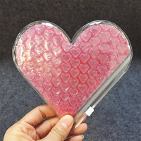 Sac d'expédition à bulles en PVC réutilisable rose avec fermeture éclair thermoscellable et impression blanche en forme de cœur