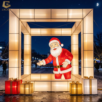 Weihnachtsmann-Foto-Spot-Rahmen mit Beleuchtung für Themenparks und Einkaufszentren bei Feiertagsevents