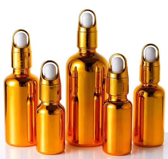 Yüksek kaliteli yüksek son benzersiz lüks lüks kozmetik elektroliz gül altın altın gümüş damlalıklı cam şişeler şişeler
