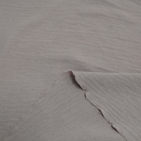 Tissu tissé teint en filature à texture froissée naturelle 100% polyester pour la production de vêtements et la couture