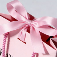 Sacs en papier écologiques de qualité supérieure avec poignées mignonnes pour l'emballage de bijoux, de lunettes et de montures optiques, en couleurs personnalisées