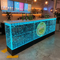 Comptoir de réception mural à bulles d'eau lumineuses LED en plastique moderne et personnalisé pour bar à domicile, hôtel et centre commercial