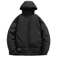 Veste d'hiver rembourrée à capuche noire, doublure matelassée camel contrastante, fermeture éclair sur la poitrine et poches obliques, poignets à velcro, manteau chaud
