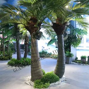 Venta al por mayor de árboles de hoja de coco artificiales decorativos de Interior de imitación para la venta