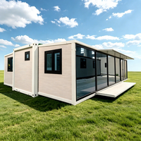 Maison conteneur préfabriquée moderne, portable, extensible et respirante, tout-en-un, pour bureau, école ou bâtiment modulaire.