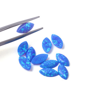 Vente en gros <span class=keywords><strong>OP06</strong></span> bleu australien opale pierres précieuses en vrac marquise cabochon à fond plat en forme de feuille synthétique opale de feu - Product Image 1