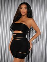 Nouveau robe noire sans bretelles creuse de discothèque sexy à la mode pour femmes vente en gros