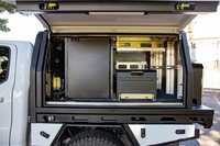 Ecocampor 4x4, plateau de camionnette, auvent de camping-car, plateau en aluminium et topper, remorque avec boîte à outils, cuisine et lit disponibles à la vente