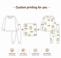 Guai Vente en gros de pyjamas pour enfants qui brillent dans le noir, ensemble de vêtements de nuit doux et respirants pour l'heure du coucher