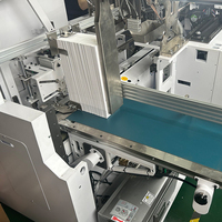 Machine d'insertion de corde de sac en papier Machine d'enfilage de corde pour sac à main Machine de fabrication de sac en papier pour fixation de poignée de sac en papier