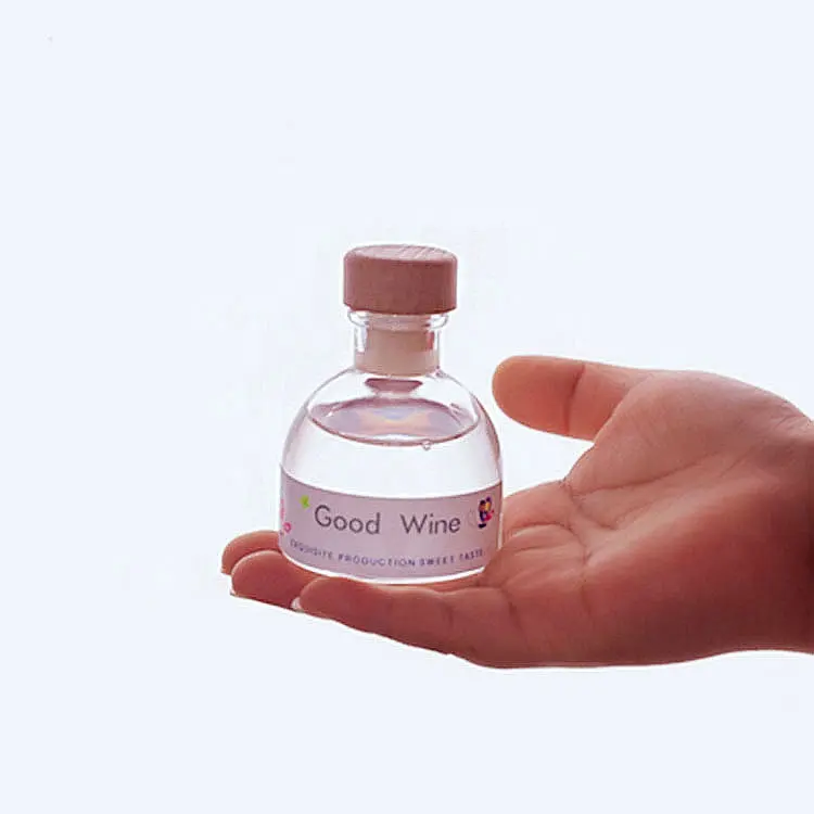 50ML 100ML round transparent mini whiskey wine 150ml glass vodka whiskey bottle with cork cap small bottle