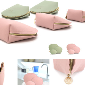 Trendy clutch makeup bag, Instagram-worthy creative accessory bag, gift bag, PU leather wave-shaped <b>toiletry</b> bag - Product Image 1