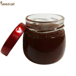 BEESTAR <span class=keywords><strong>miel</strong></span> negra natural orgánica entera 100% pura cruda y dulce para cocinar/hornear envasada a granel para venta al por mayor - Product Image 1