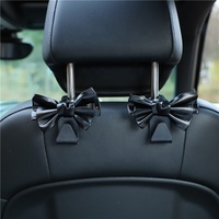 Nouveau crochet de rangement pour dossier de siège de voiture Keynew, en cuir PU, avec nœud, support universel pour sacs et sacoches, clips de fixation automobile, capacité de charge 20 kg