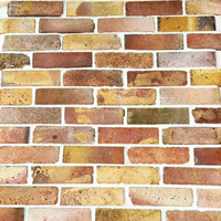 Briques en pierre artificielle rouge de surface solide de conception classique moderne pour l'extérieur, l'intérieur, les comptoirs de revêtement en pierre coupés à la taille