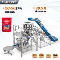 Machine d'emballage rotative pour noix, fruits secs, arachides, sachets préformés Doypack