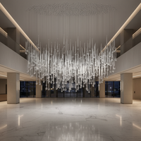 Lustre en cristal K9 en forme de goutte de pluie, design artistique minimaliste et luxueux, personnalisé pour la décoration de salle de mariage, idéal pour le hall d'hôtel