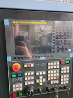 Tour à lit incliné CNC Doosan PUMA2450 d'occasion, machine de tournage et de fraisage, système FANUC, tour CNC