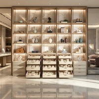 Vitrine murale à LED multi-niveaux en verre pour bijoux, avec tiroirs de rangement, sur mesure pour l'intérieur d'une galerie de bijoux