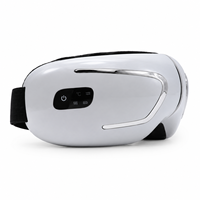 Masque de massage oculaire avec compresse chaude, compression d'air et vibration, appareil portable argenté pour le soin des yeux