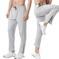 Nouveau pantalon de jogging léger et décontracté en polyester/nylon à séchage rapide avec fermeture éclair et cordon de serrage pour homme, idéal pour la course et la gym