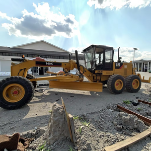 Б/у автогрейдер Caterpillar GC 140K (Япония, 2020 г.) в наличии, с отвалами - Product Image 1