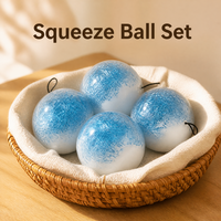 Balle anti-stress sensorielle transparente en gel souple, effet marbre flottant bleu glacé, pour la relaxation et les voyages