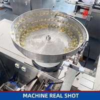 Machine automatique horizontale de comptage et d'emballage pour clous et vis en fil d'acier, destinée aux sachets préformés stand-up