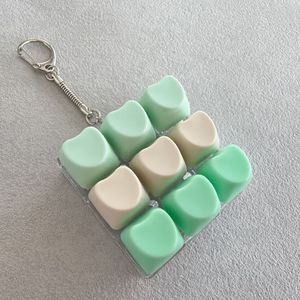พวงกุญแจรูปหัวใจ 9 in 1 แบบ DIY จับคู่สีได้เอง ของเล่นคลายเครียดแบบกดปุ่ม สวิตช์กลไก - Product Image 2