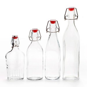 Bouteilles d'eau en verre transparentes rondes/carrées de haute qualité avec couvercle à clip pour Kombucha, bière, <span class=keywords><strong>tequila</strong></span> et boissons gazeuses - Product Image 1