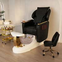 Fauteuil de pédicure professionnel moderne et luxueux pour salon de manucure, avec bain de pieds électrique.
