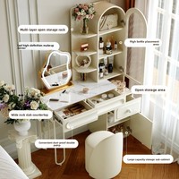 Table de maquillage minimaliste de style français, avec armoire haute en verre trempé à arche incurvée, étagère ouverte multi-niveaux et tiroir