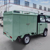 Nouveau tricycle à quatre roues Petite fourgonnette Véhicules électriques Boîte de chargement Camions légers Ev Prix Commerce