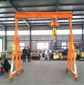 Gantry crane and electric chain hoist for lifting and changing mold