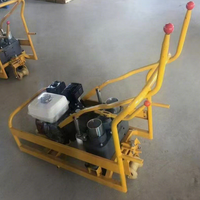 Clé à vis à double extrémité pour vis de chenille de machine de maintenance routière, pour le retrait des boulons